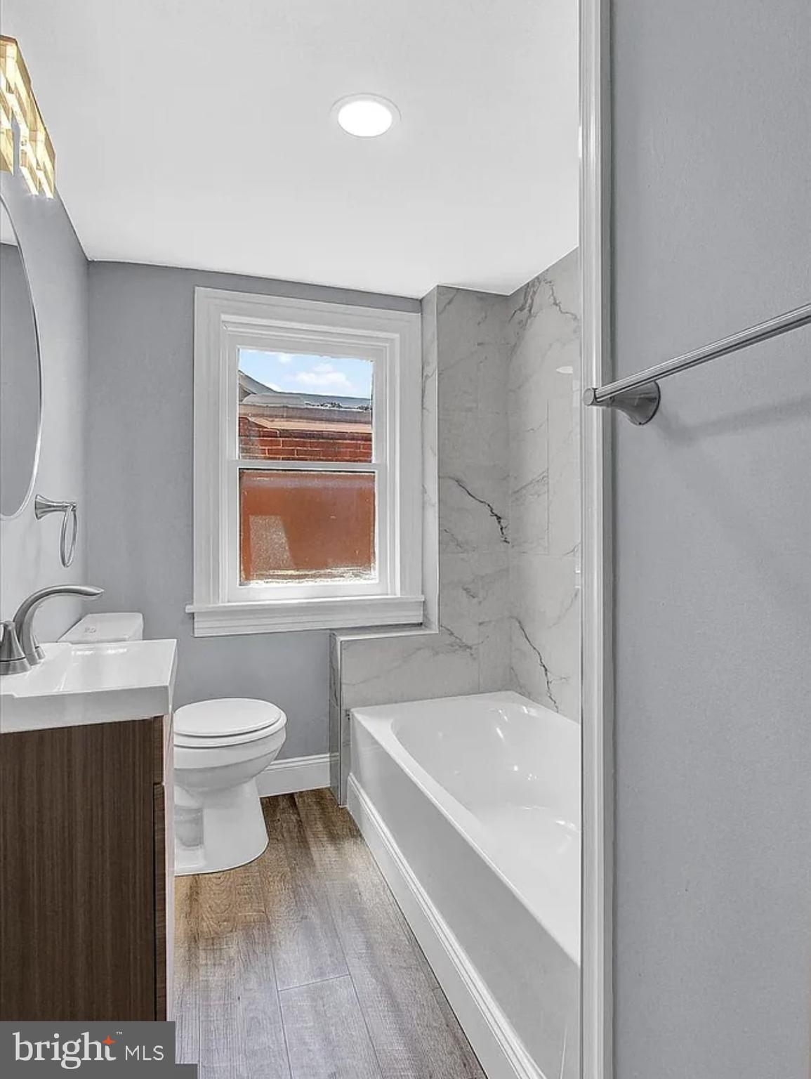 56 North Main Street Spring Grove, PA 17362 - Photo 18 of 25 a bathroom with a sink toilet and shower