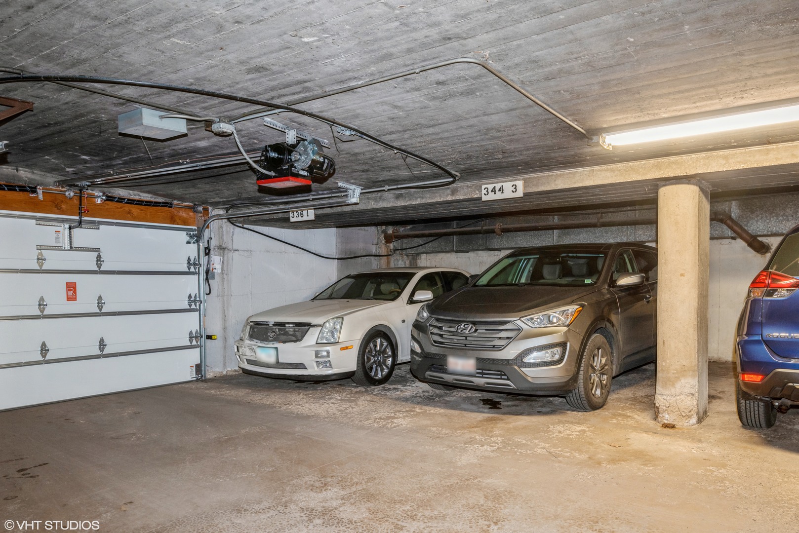344 Ridge Avenue, Unit 3 Evanston, IL 60202 - Photo 11 of 13 a view of parking garage with cars parked