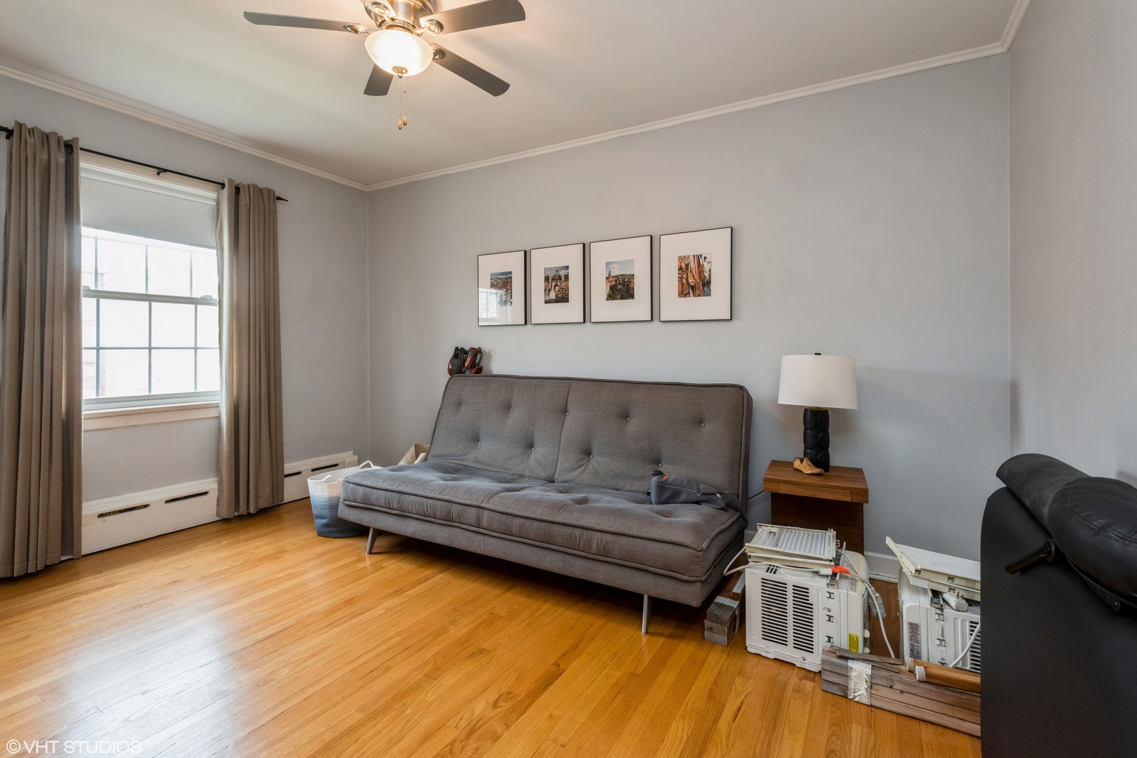 344 Ridge Avenue, Unit 3 Evanston, IL 60202 - Photo 9 of 13 a living room with furniture and a wooden floor