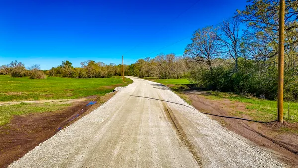 a view of a golf course with a garden