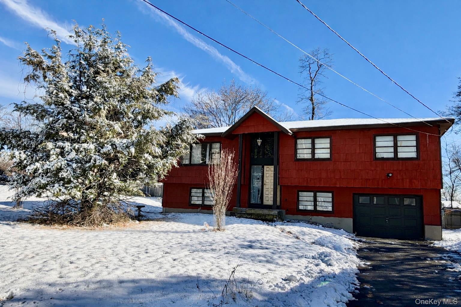 534 High Street Monroe, NY 10950 - Photo 1 of 1 a front view of a house with a yard