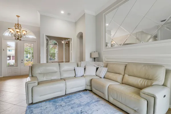 a kitchen with stainless steel appliances granite countertop a stove top oven a sink a counter top space and cabinets