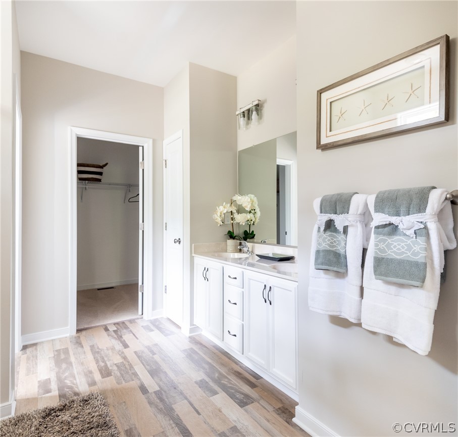 4936 Lancewood Road Chesterfield, VA 23832 - Photo 20 of 24 a bathroom with a sink and a mirror