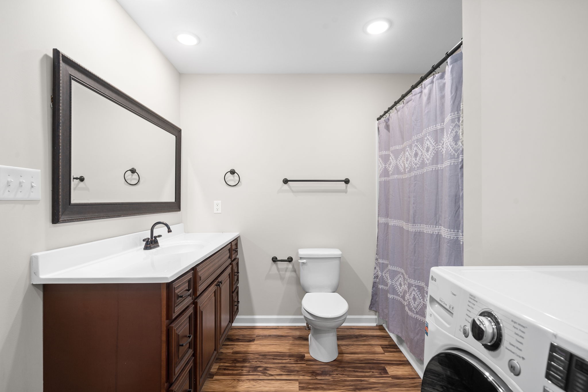 1709 Evans Road, Unit A Clarksville, TN 37042 - Photo 11 of 23 a bathroom with a sink and a mirror