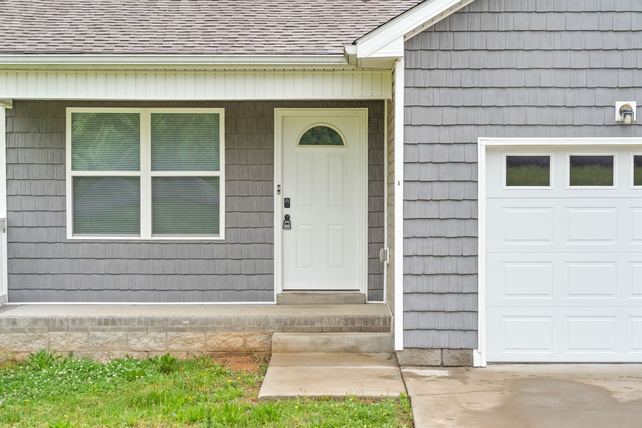 1709 Evans Road, Unit A Clarksville, TN 37042 - Photo 2 of 23 a front view of a house with a yard