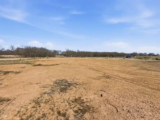 a view of an ocean with a mountain