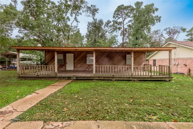 a view of backyard with green space