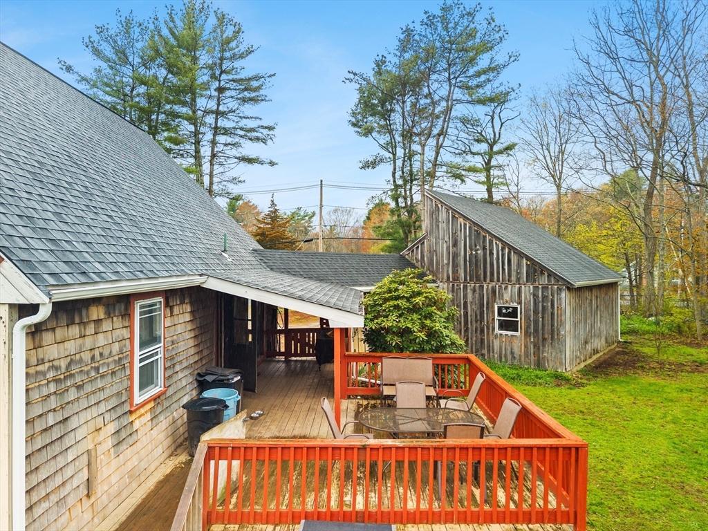 1080 Locust Street Raynham, MA 02767 - Photo 31 of 42 a view of a house with backyard and sitting area