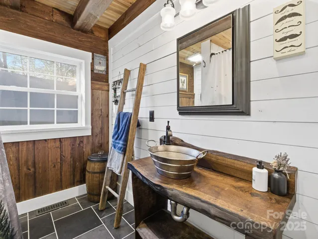 a close view of light fixtures and wooden floor