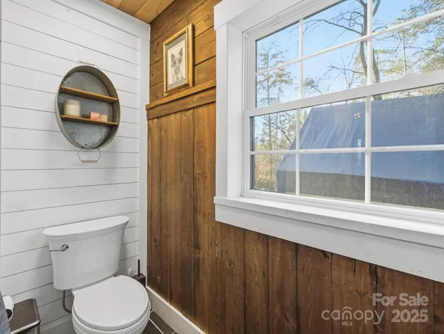 a bathroom with a toilet and a sink