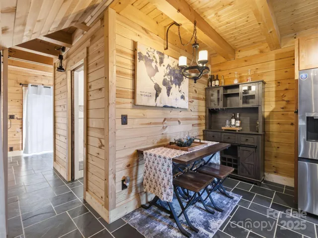 a view of a dinning tables and chairs in the balcony