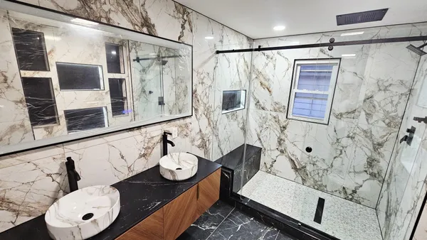 a living room with a couch and a fireplace