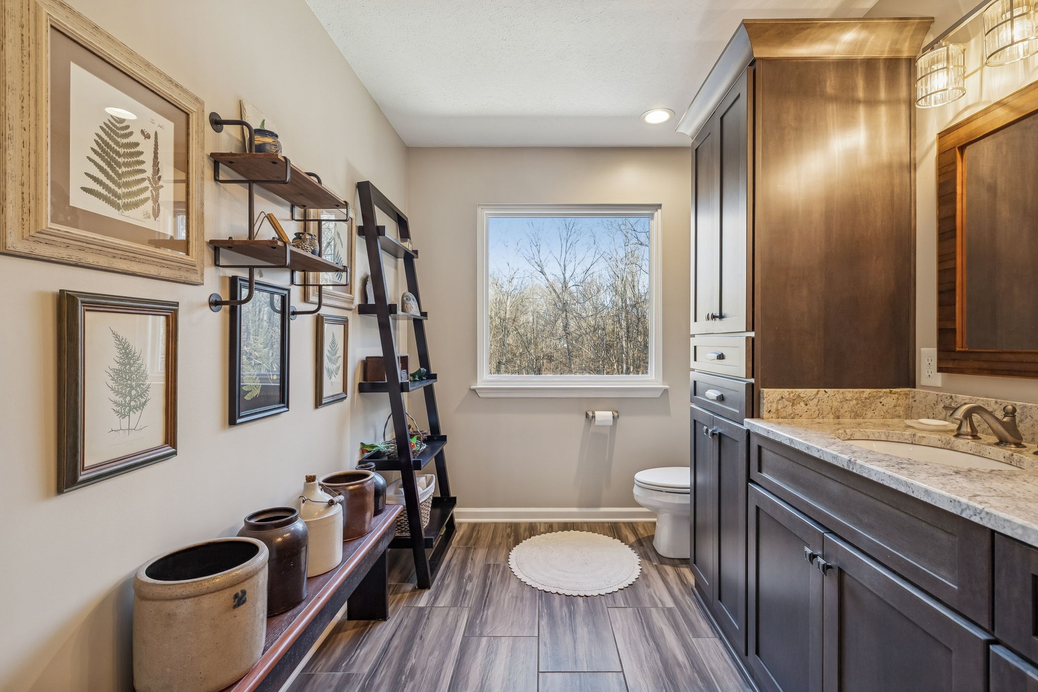 1060 Satterwhite Road Ashland City, TN 37015 - Photo 21 of 38 a bathroom with a sink and a mirror