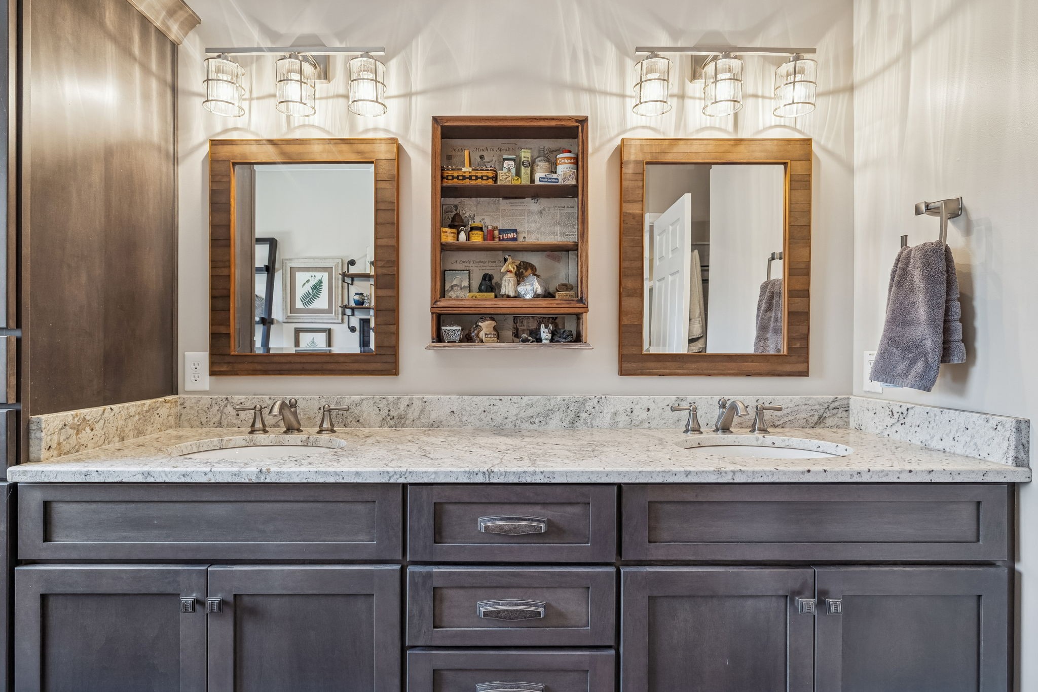 1060 Satterwhite Road Ashland City, TN 37015 - Photo 22 of 38 a bathroom with a sink vanity and a mirror