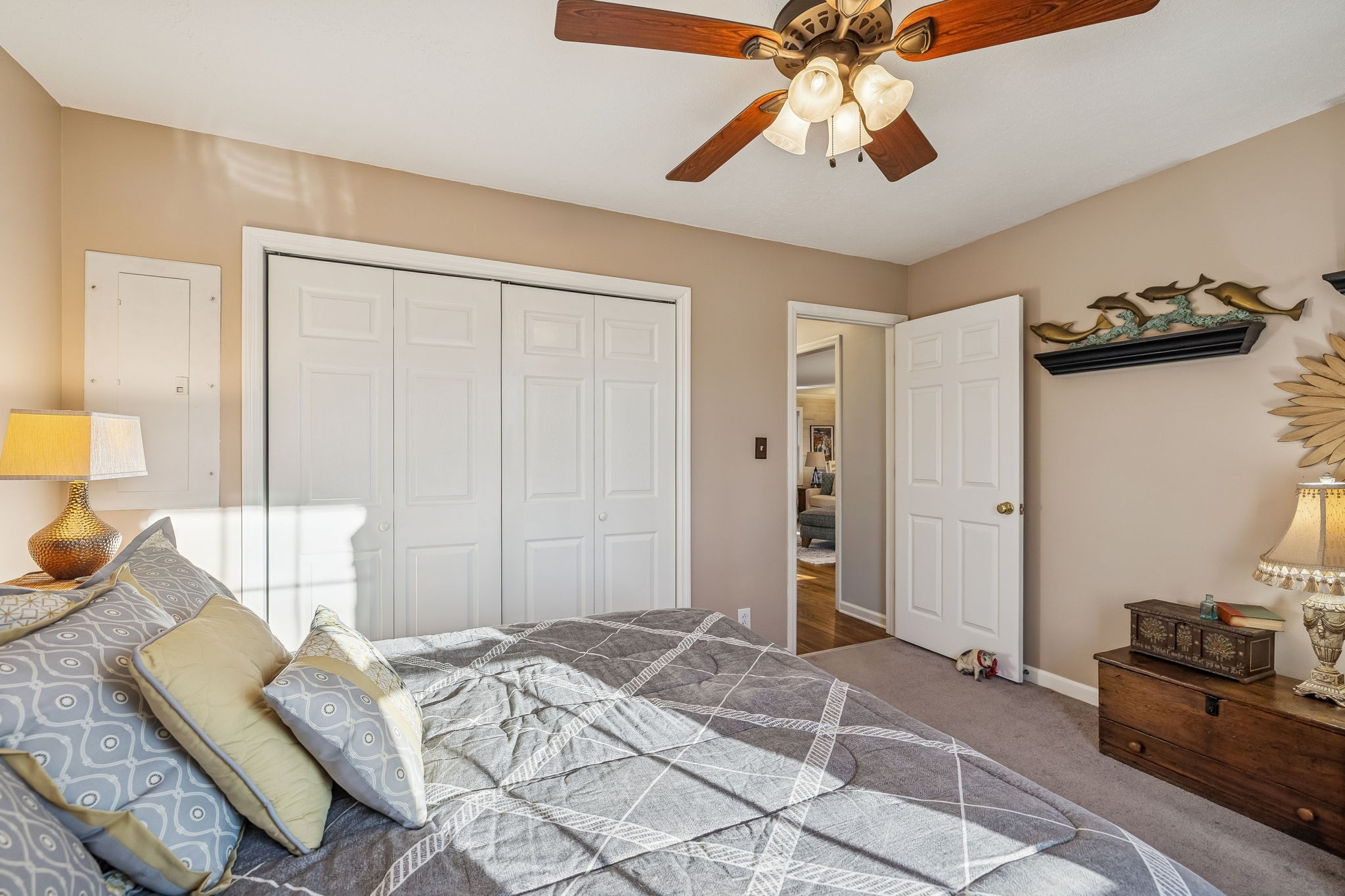 1060 Satterwhite Road Ashland City, TN 37015 - Photo 25 of 38 a bedroom with a bed and a chandelier