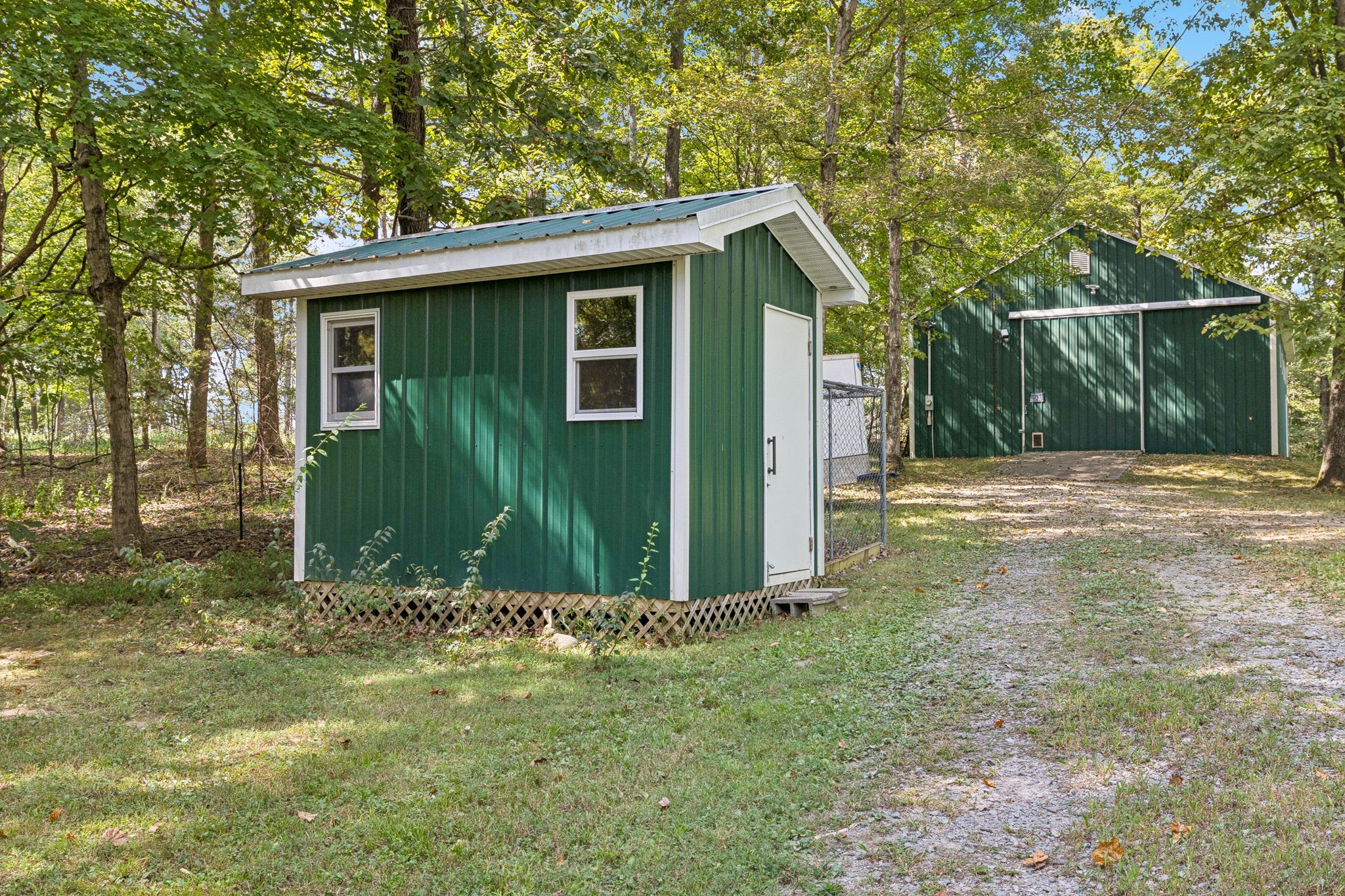 1060 Satterwhite Road Ashland City, TN 37015 - Photo 37 of 38 a view of a house with yard and tree s