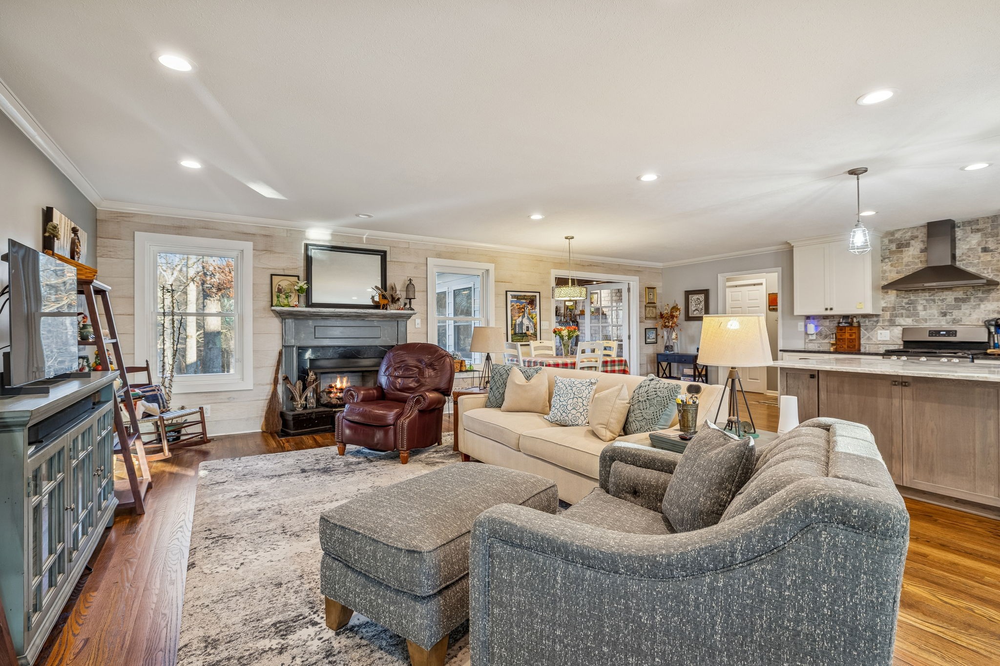1060 Satterwhite Road Ashland City, TN 37015 - Photo 7 of 38 a living room with furniture and a fireplace