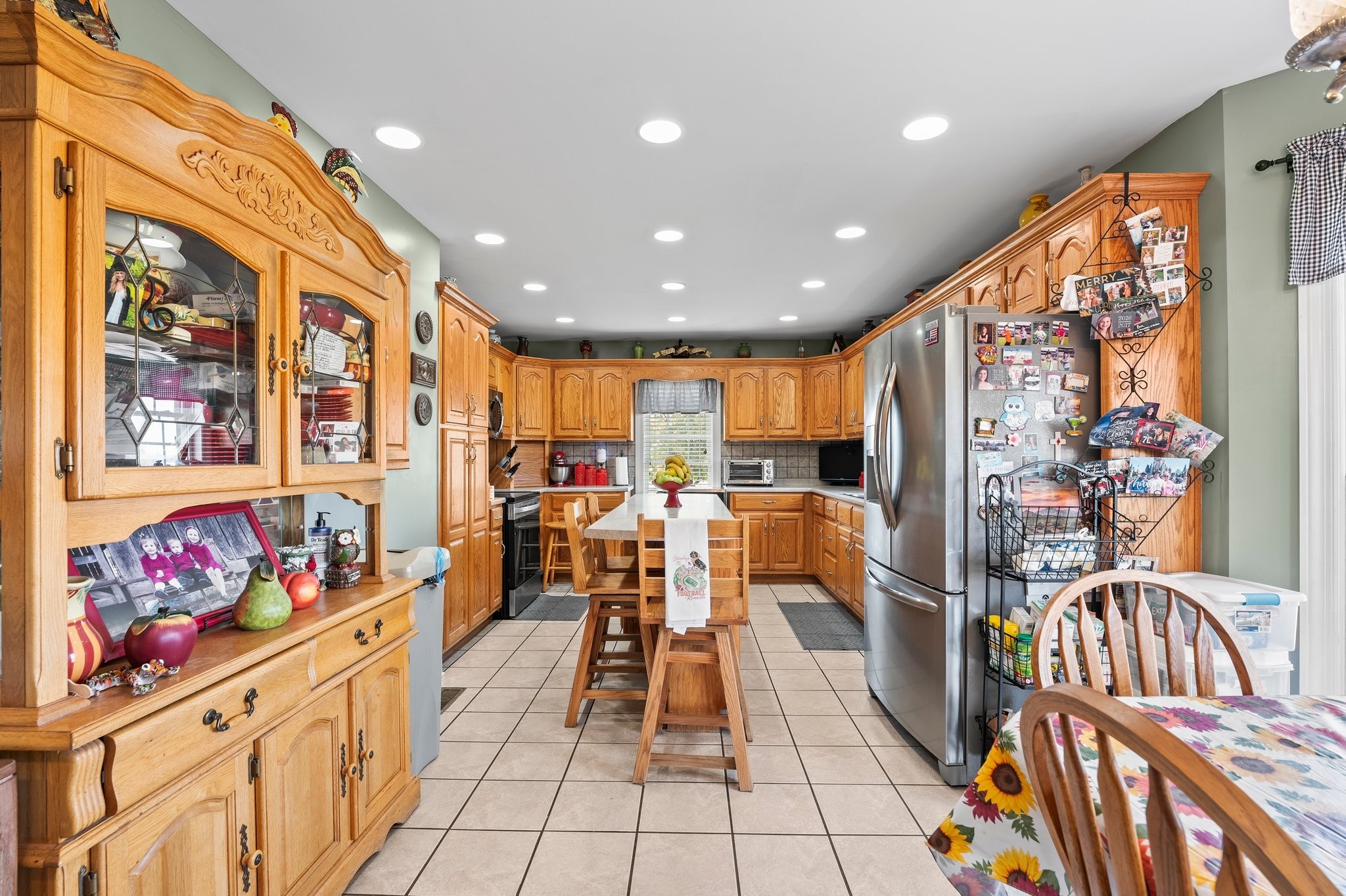 181 Hickory Grove Road Huntland, TN 37345 - Photo 20 of 41 a kitchen with stainless steel appliances kitchen island granite countertop a refrigerator and a view of living room