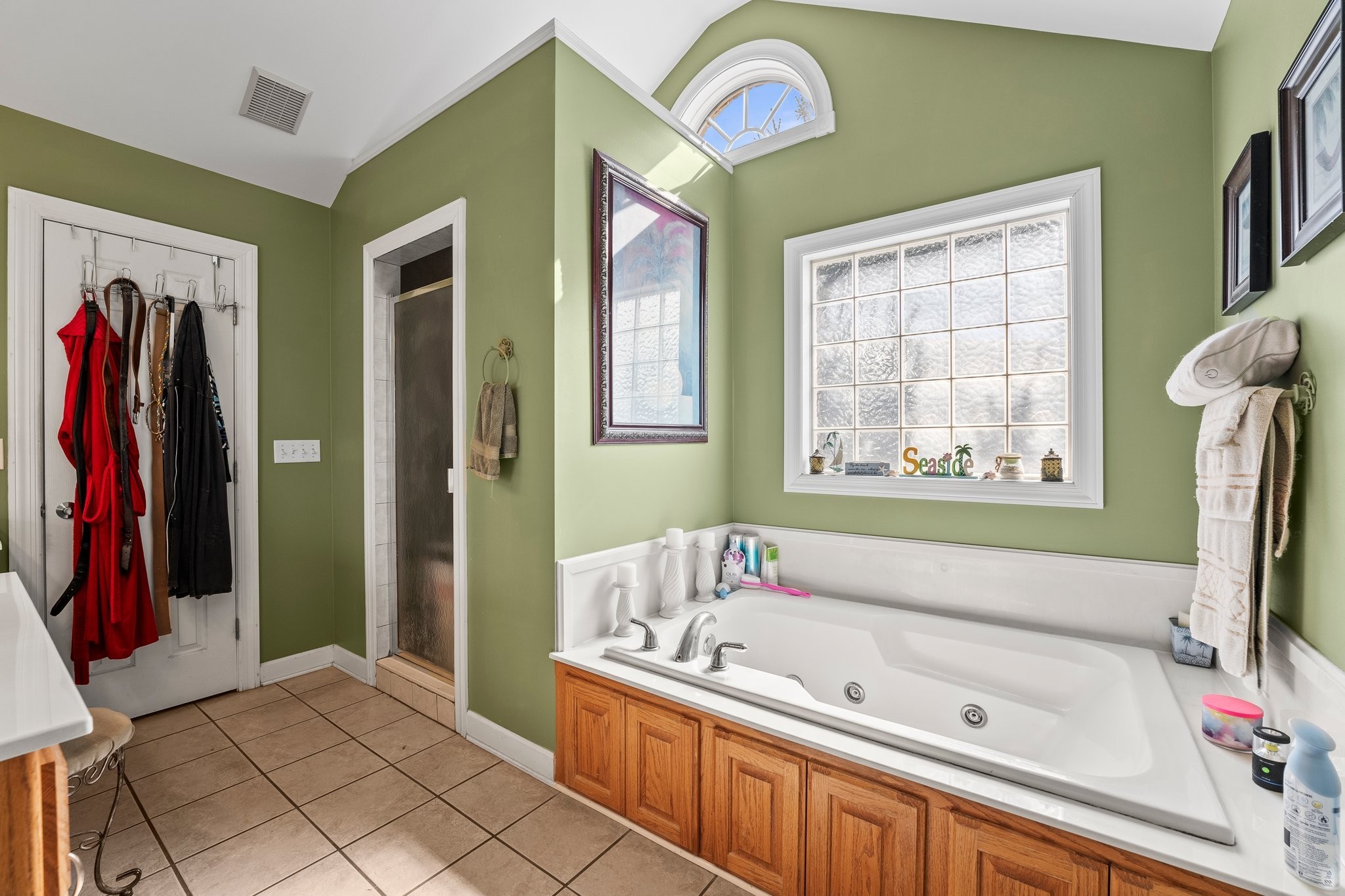 181 Hickory Grove Road Huntland, TN 37345 - Photo 24 of 41 a bathroom with a tub a sink and a window