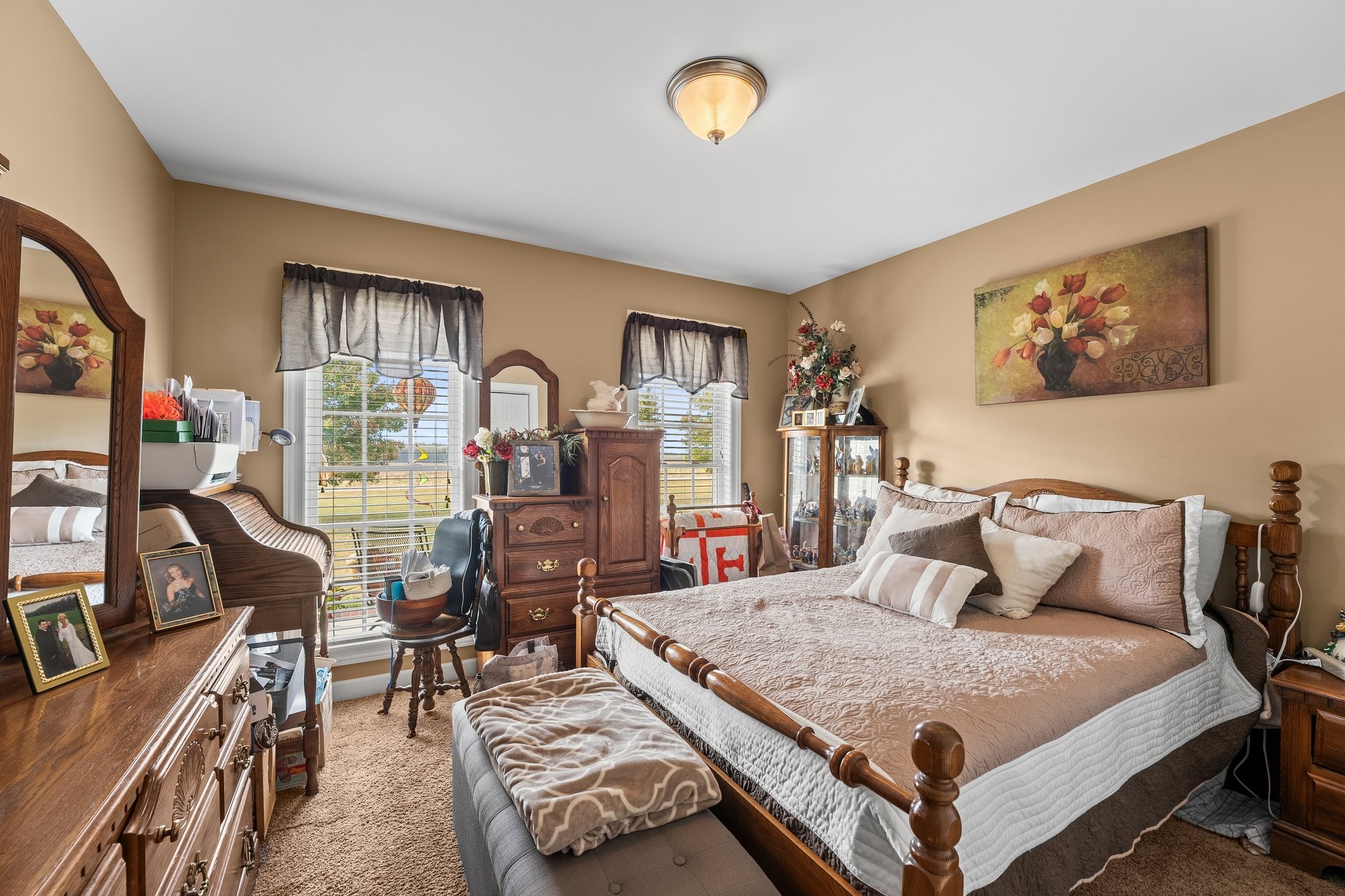 181 Hickory Grove Road Huntland, TN 37345 - Photo 25 of 41 a bedroom with a bed a dresser next to a window