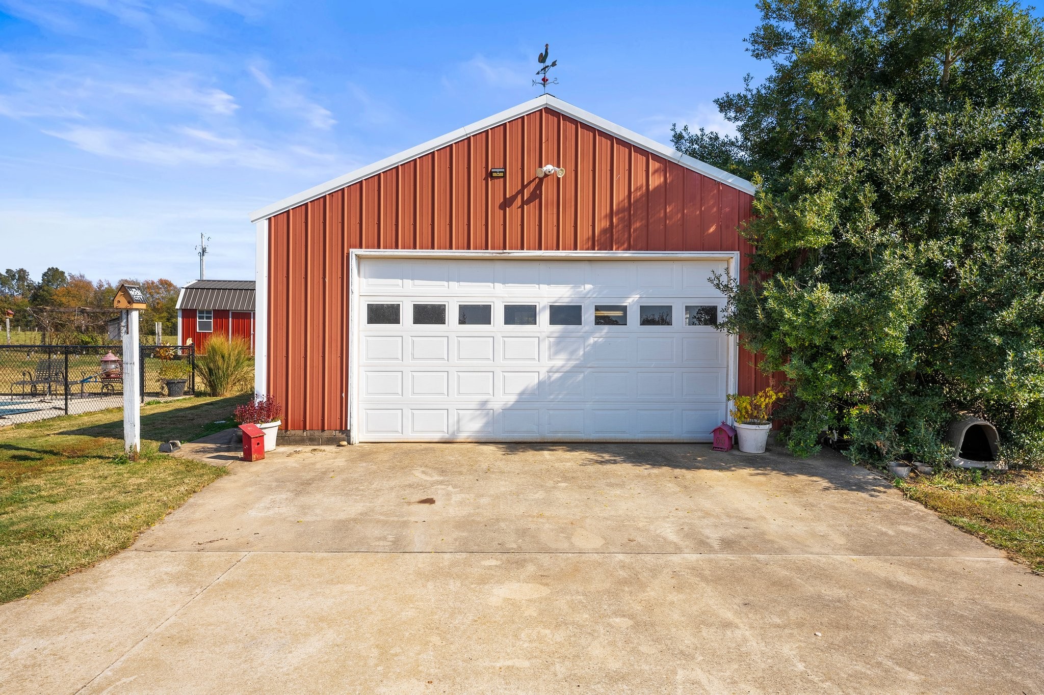 181 Hickory Grove Road Huntland, TN 37345 - Photo 33 of 41 a view of an house with backyard and trees in the background