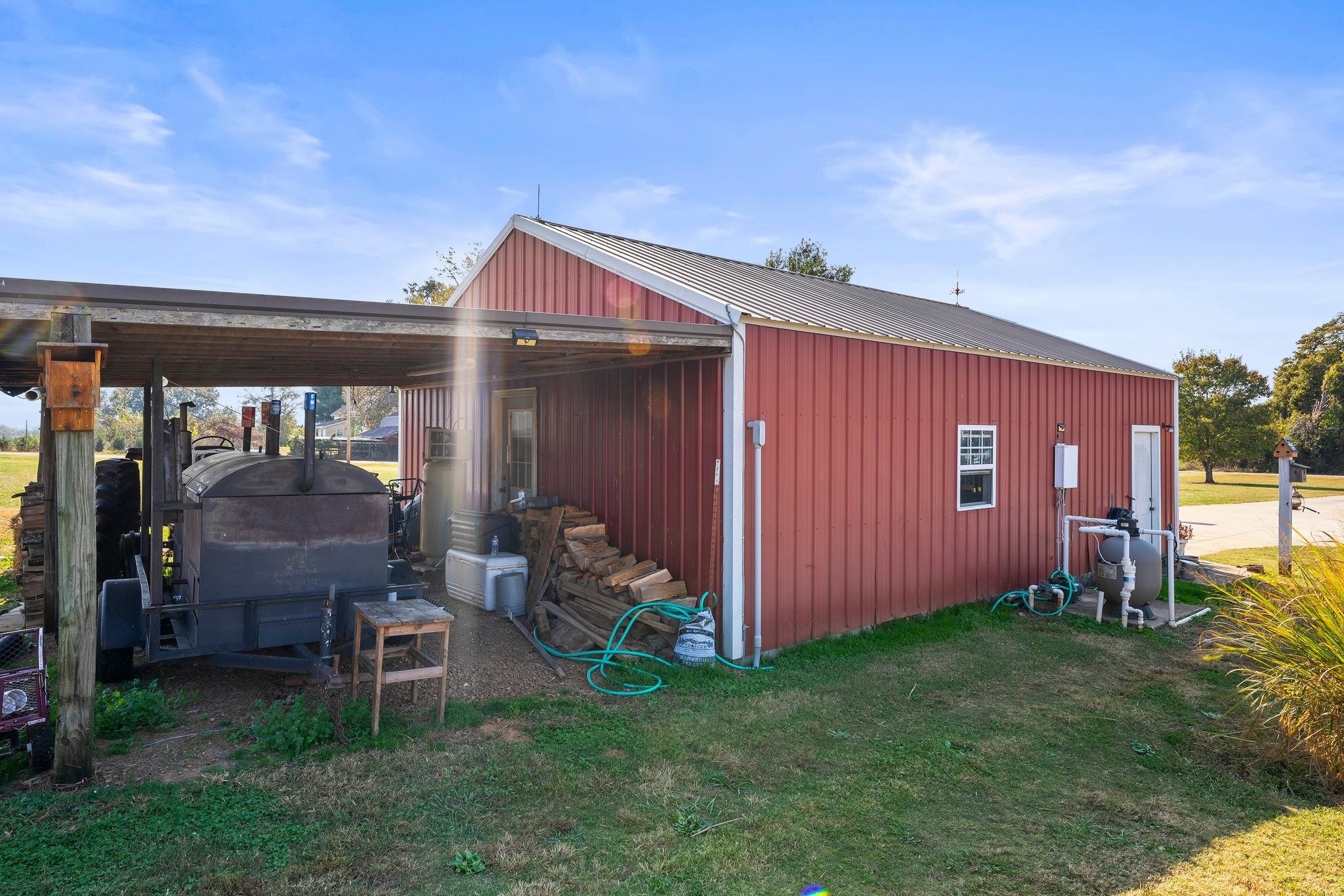 181 Hickory Grove Road Huntland, TN 37345 - Photo 35 of 41 a backyard of a house with table and chairs