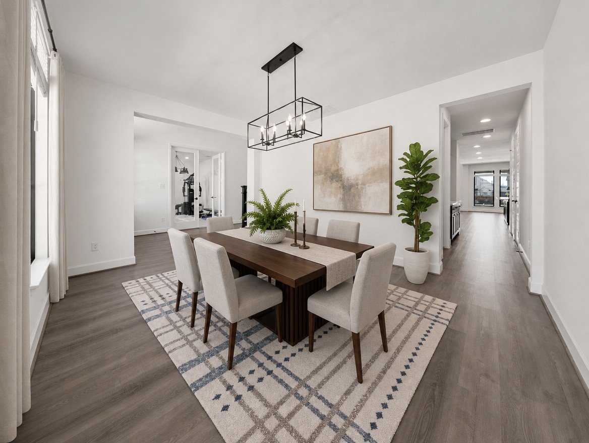 1440 Riva Ridge Drive Leander, TX 78641 - Photo 3 of 37 Elegant dining space boasts abundant natural light and an overhead linear chandelier.