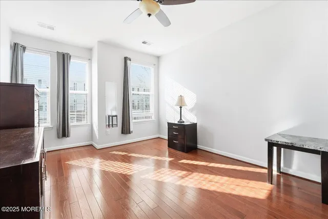 a view of livingroom with furniture and wooden floor