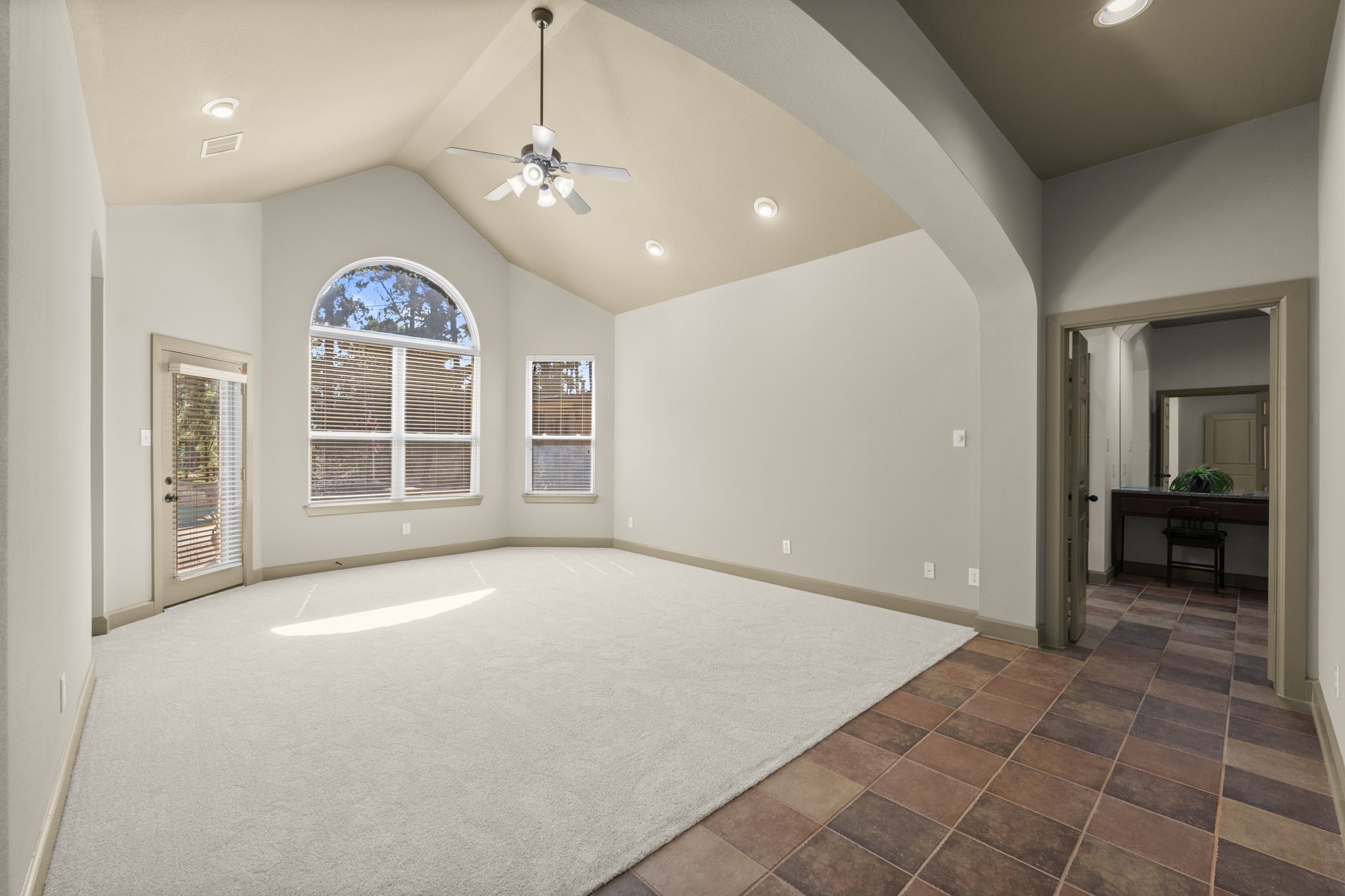 1534 Virgie Community Road Magnolia, TX 77354 - Photo 26 of 50 The exquisite primary suite offers excellent space for your king bed and furniture along with its beauty and elegance.