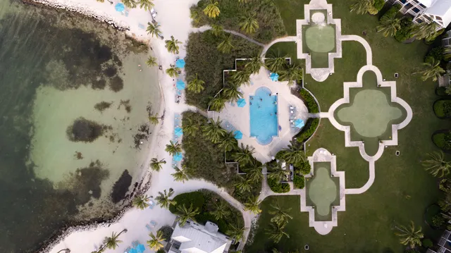 an aerial view of a house with outdoor space