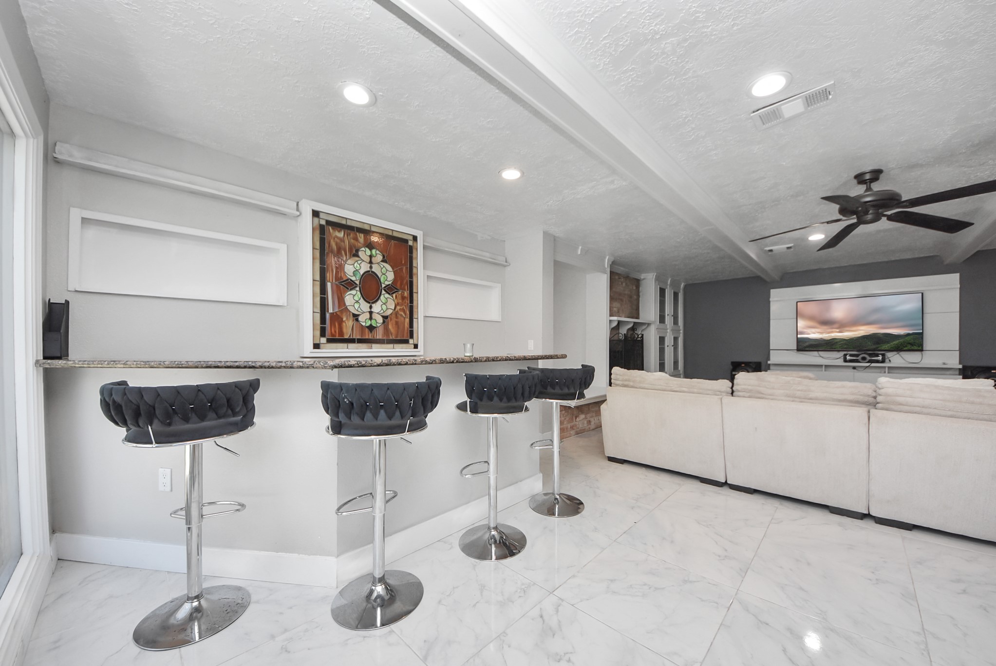 1011 Whitestone Lane Houston, TX 77073 - Photo 34 of 48 a kitchen with stainless steel appliances kitchen island granite countertop a table and chairs in it