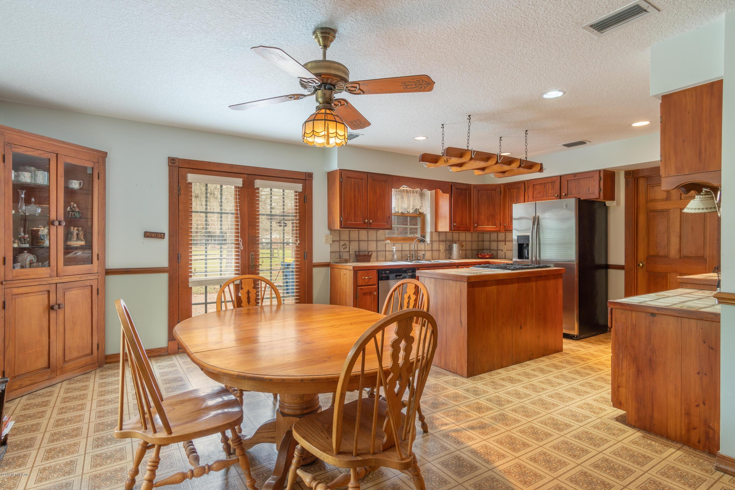 14493 Denton Road Jacksonville, FL 32226 - Photo 14 of 54 Dining Area into Kitchen