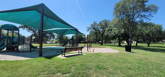 a view of a swimming pool with a sitting space