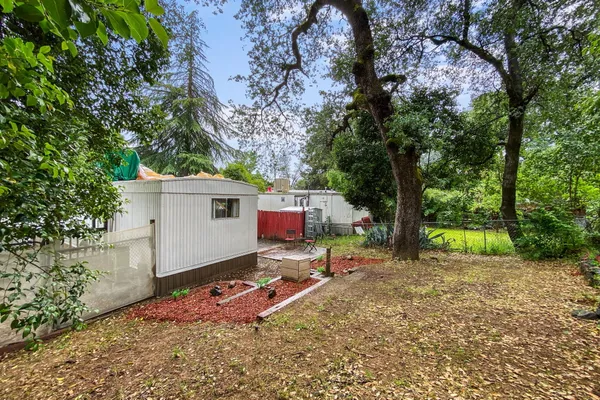 a backyard of a house with seating space