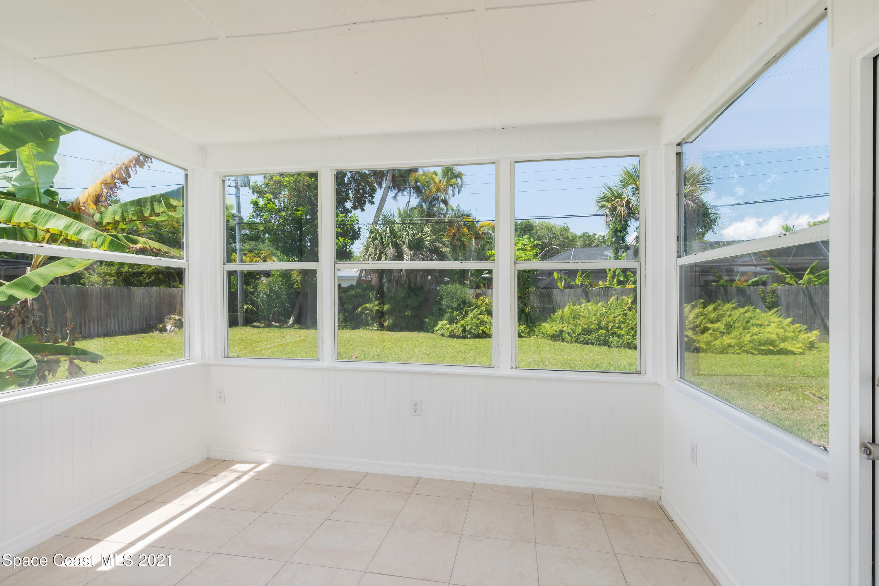 640 Java Road Cocoa Beach, FL 32931 - Photo 12 of 18 a view of an empty room with a window