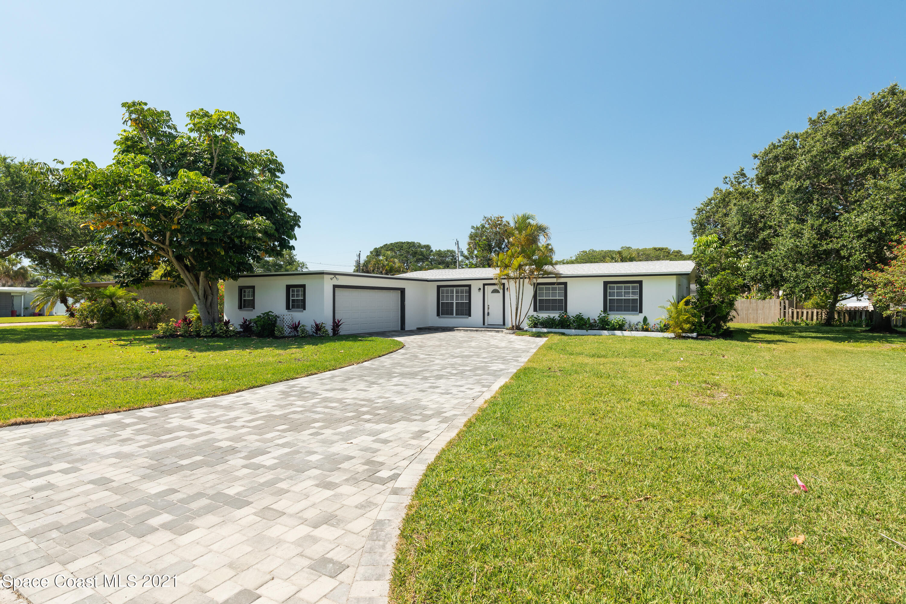 640 Java Road Cocoa Beach, FL 32931 - Photo 17 of 18 a house with garden in front of it