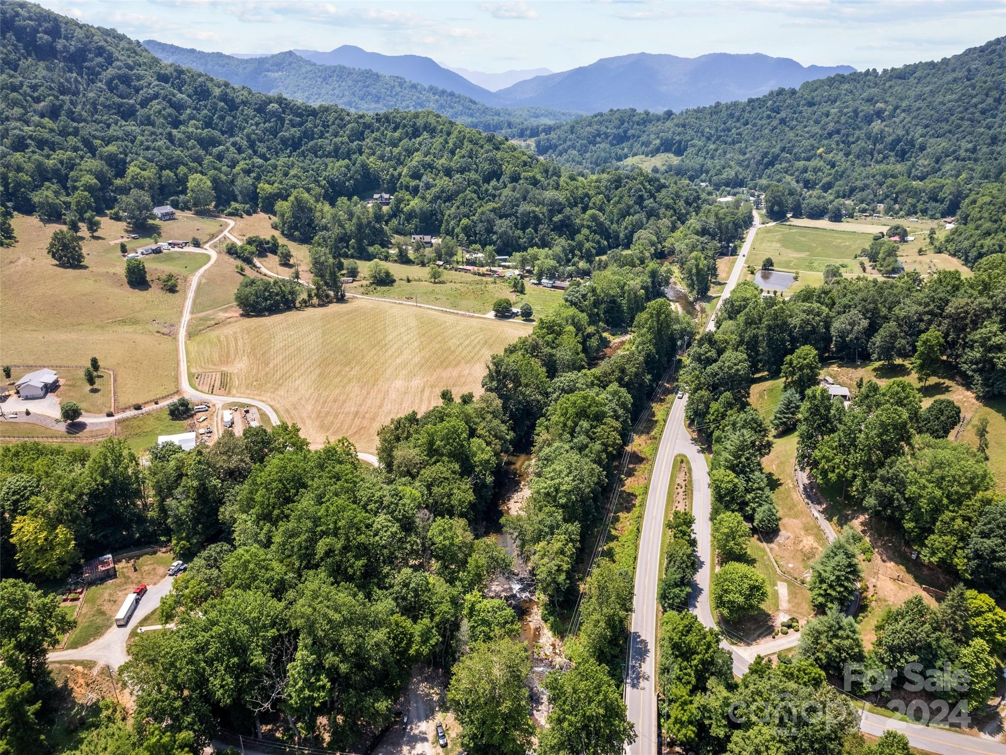 Tbd Cruso Road Canton, NC 28716 - Photo 5 of 17 a view of a city with mountains in the background