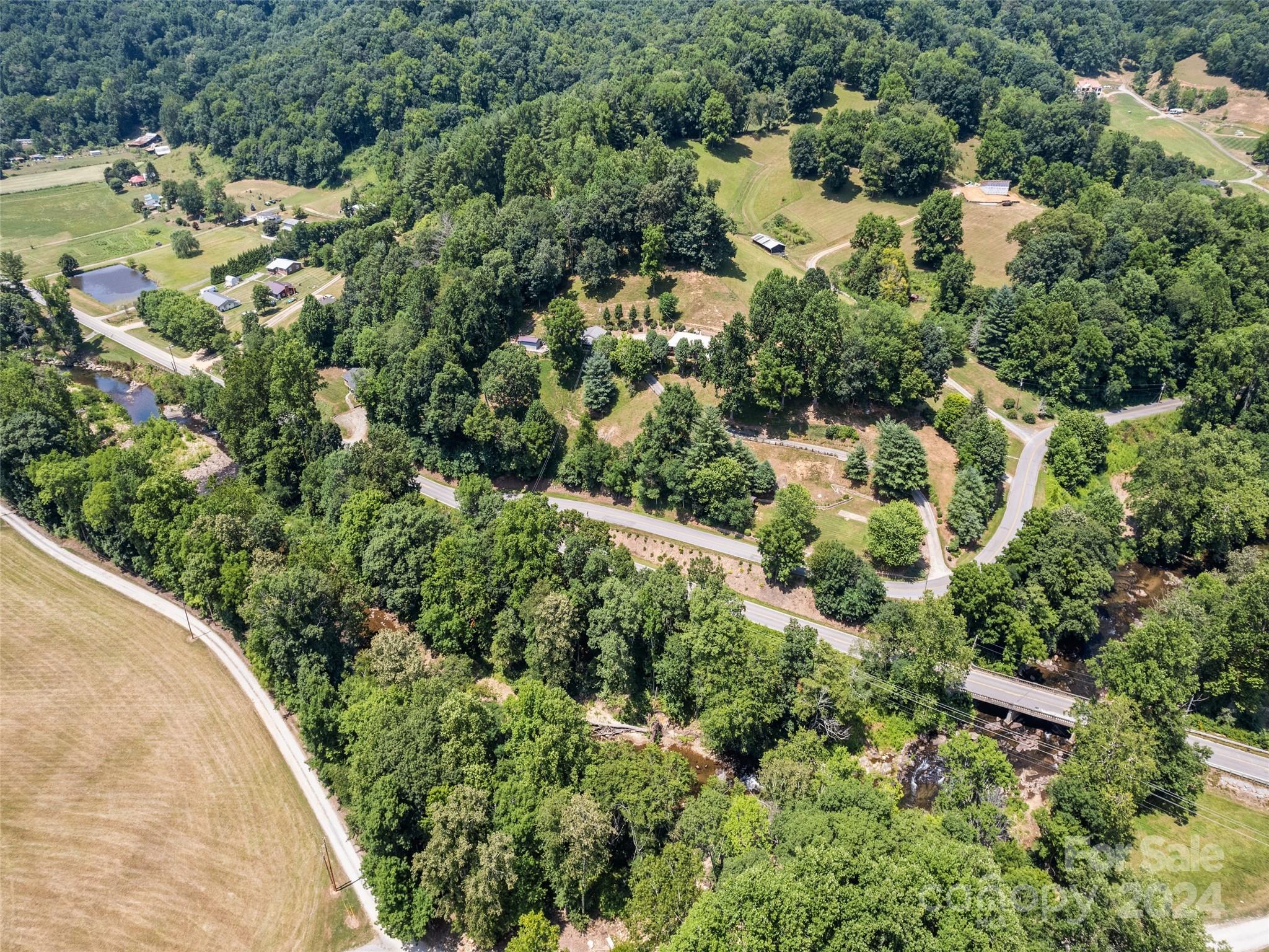 Tbd Cruso Road Canton, NC 28716 - Photo 6 of 17 an aerial view of residential house with outdoor space and trees all around