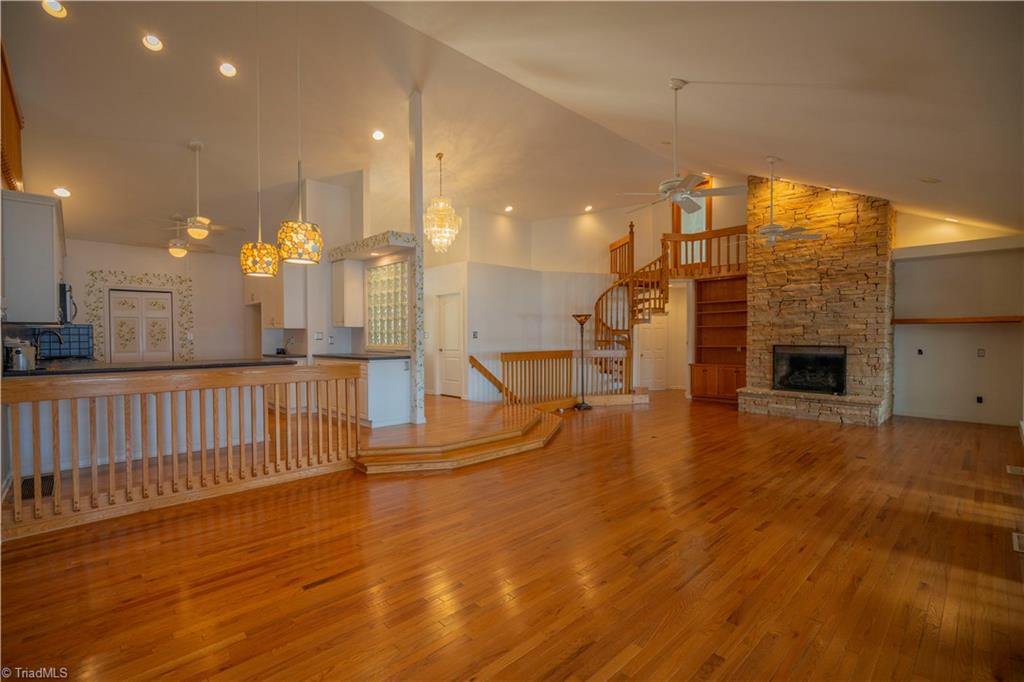 2307 Riverside Drive Lexington, NC 27292 - Photo 12 of 30 Great room & dining with stone fireplace/gas logs