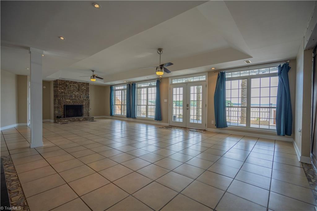 2307 Riverside Drive Lexington, NC 27292 - Photo 25 of 30 Lower level den with fireplace and access to covered patio
