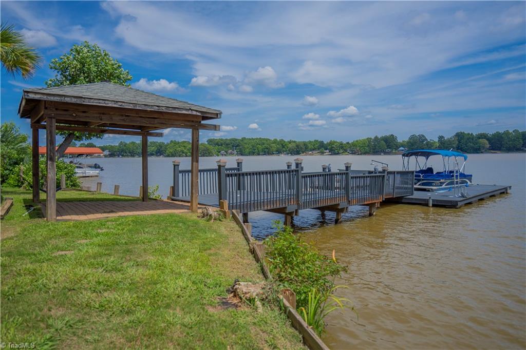Private pier with U-floater and covered deck lakeside
