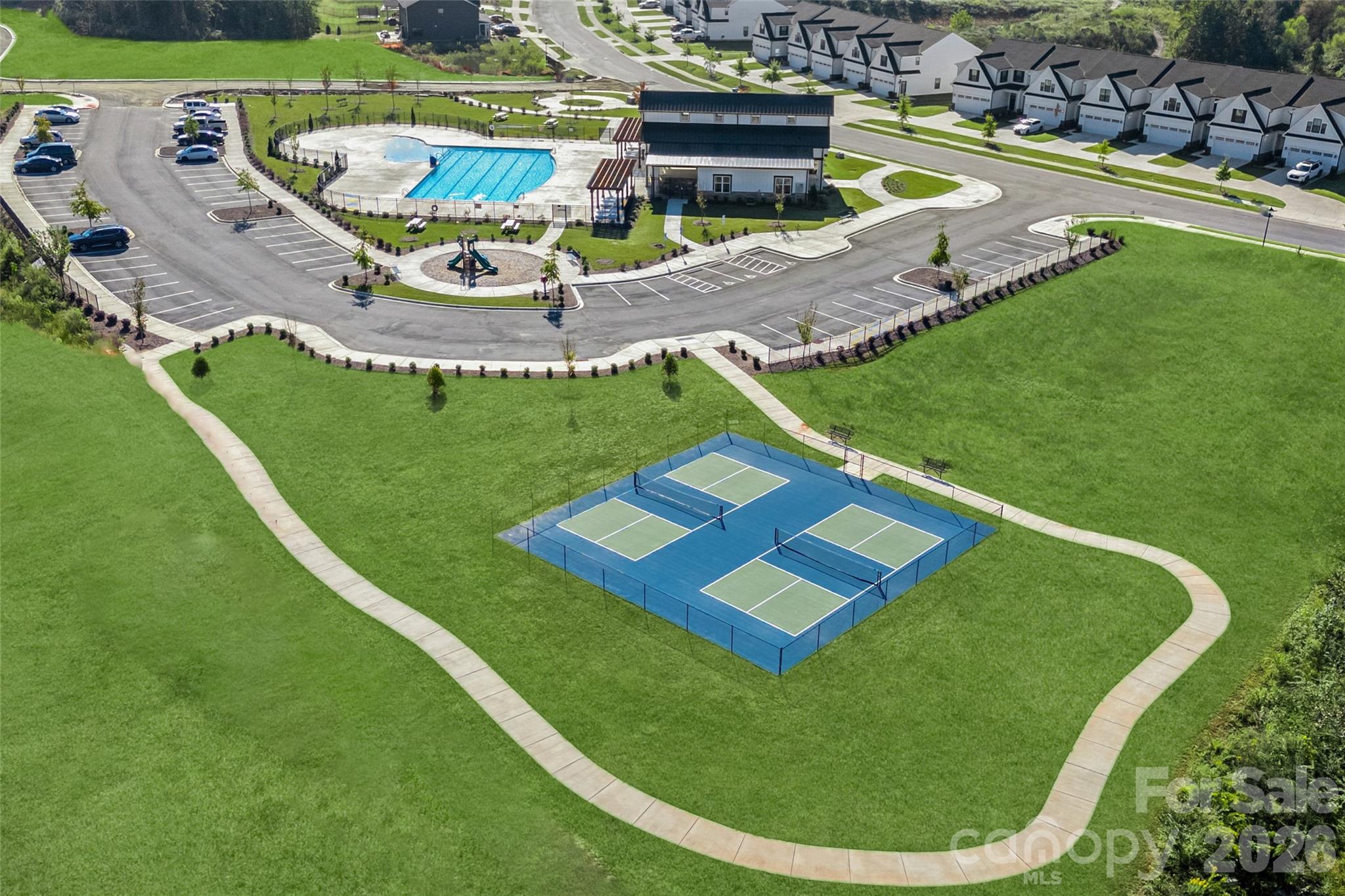 1024 Bracken Hill Road Indian Trail, NC 28079 - Photo 11 of 11 a view of a swimming pool with a yard