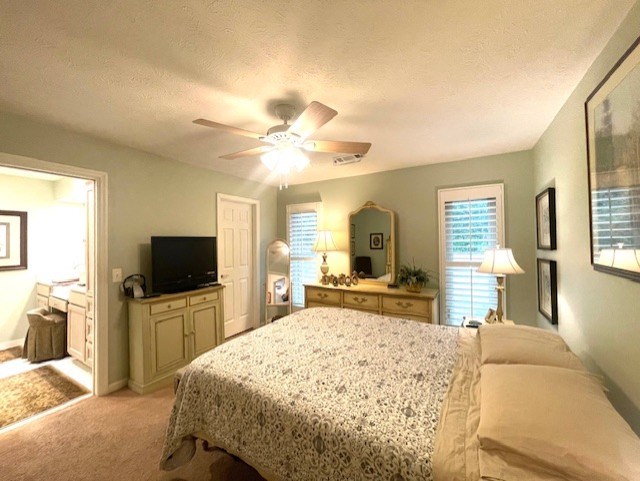 4151 Anglin Road Columbus, GA 31907 - Photo 17 of 23 a spacious bedroom with a bed and a flat screen tv