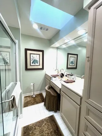 a kitchen with a sink and a stove top oven
