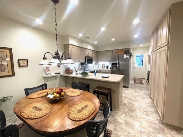4151 Anglin Road Columbus, GA 31907 - Photo 9 of 23 a kitchen with a table and chairs