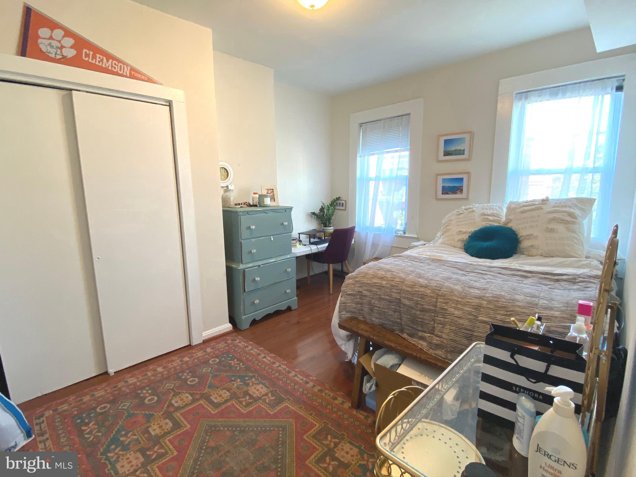 1456 Corcoran Street Northwest, Unit 3 Washington, DC 20009 - Photo 11 of 26 a bedroom with a bed dresser and a window
