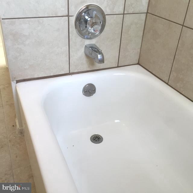 1456 Corcoran Street Northwest, Unit 3 Washington, DC 20009 - Photo 19 of 26 a view of a washer and dryer