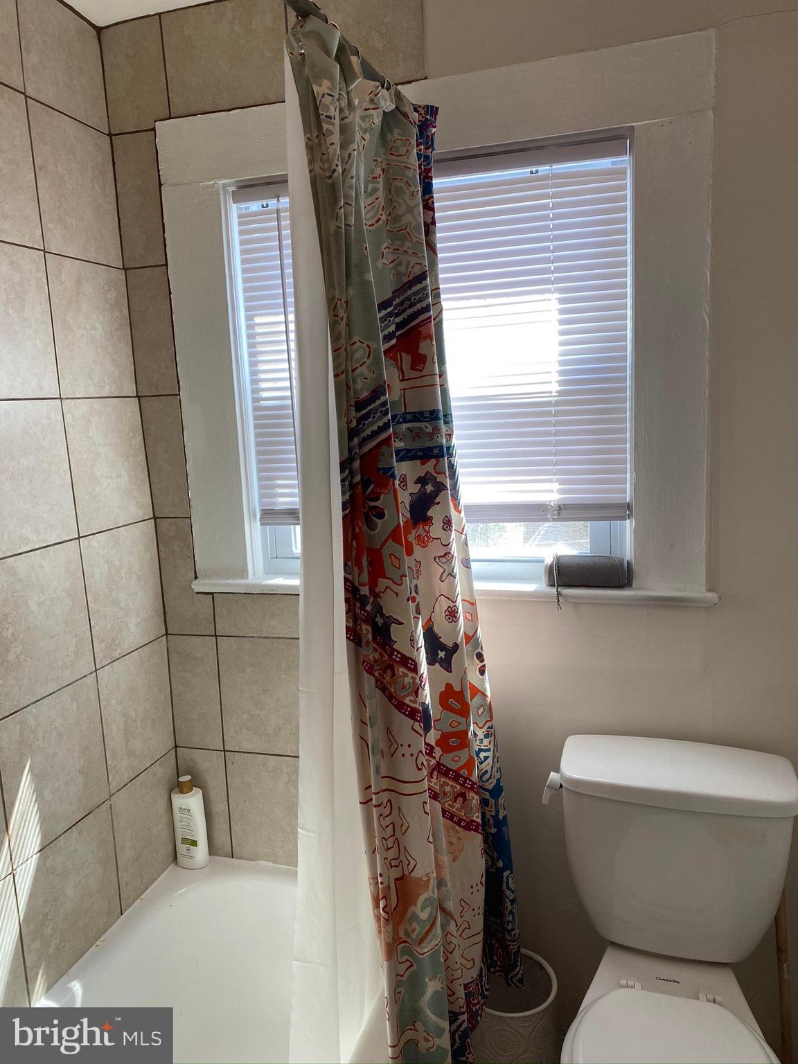 1456 Corcoran Street Northwest, Unit 3 Washington, DC 20009 - Photo 20 of 26 a bathroom with a toilet and a shower