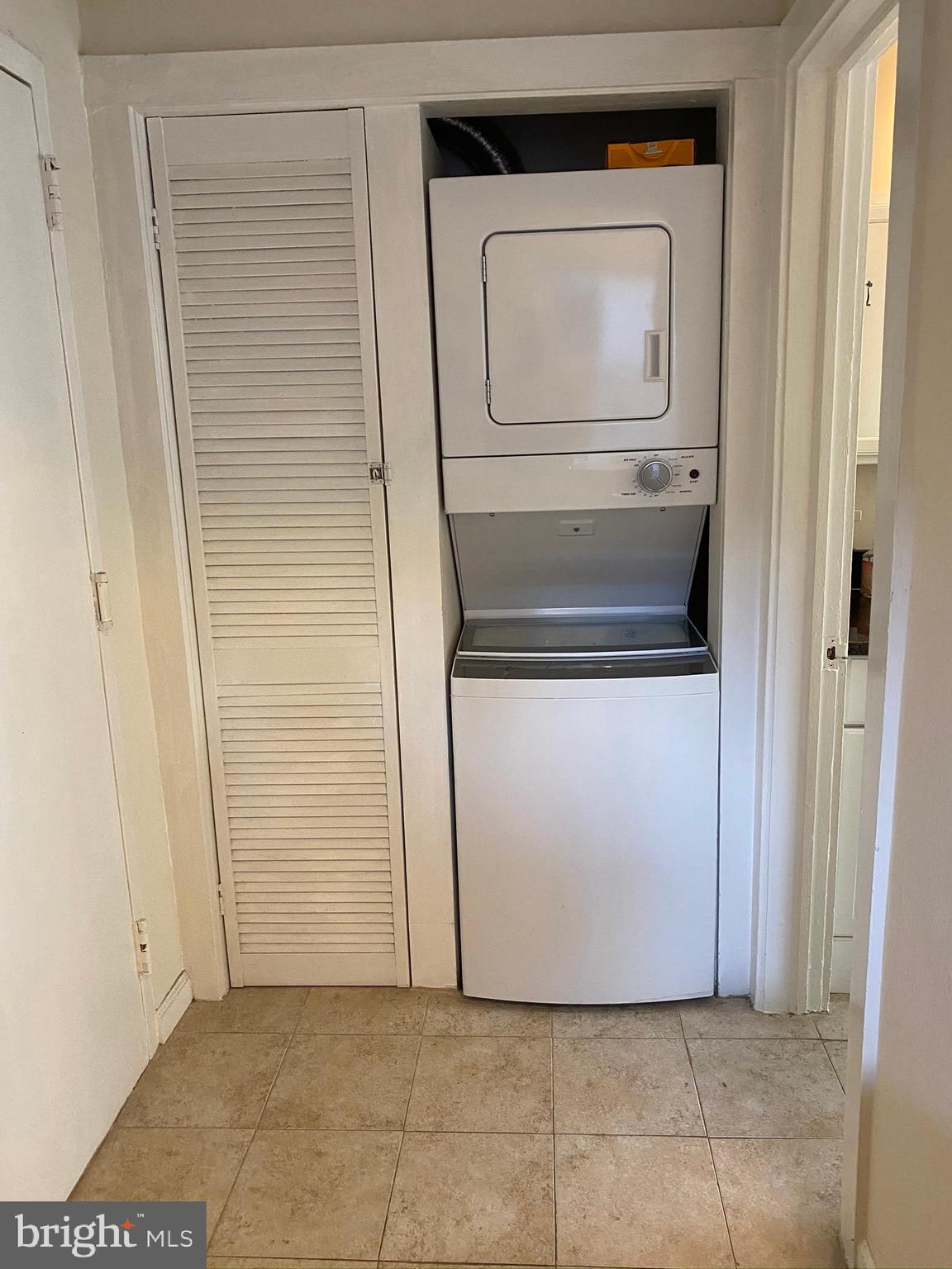 1456 Corcoran Street Northwest, Unit 3 Washington, DC 20009 - Photo 21 of 26 a utility room with washer and dryer