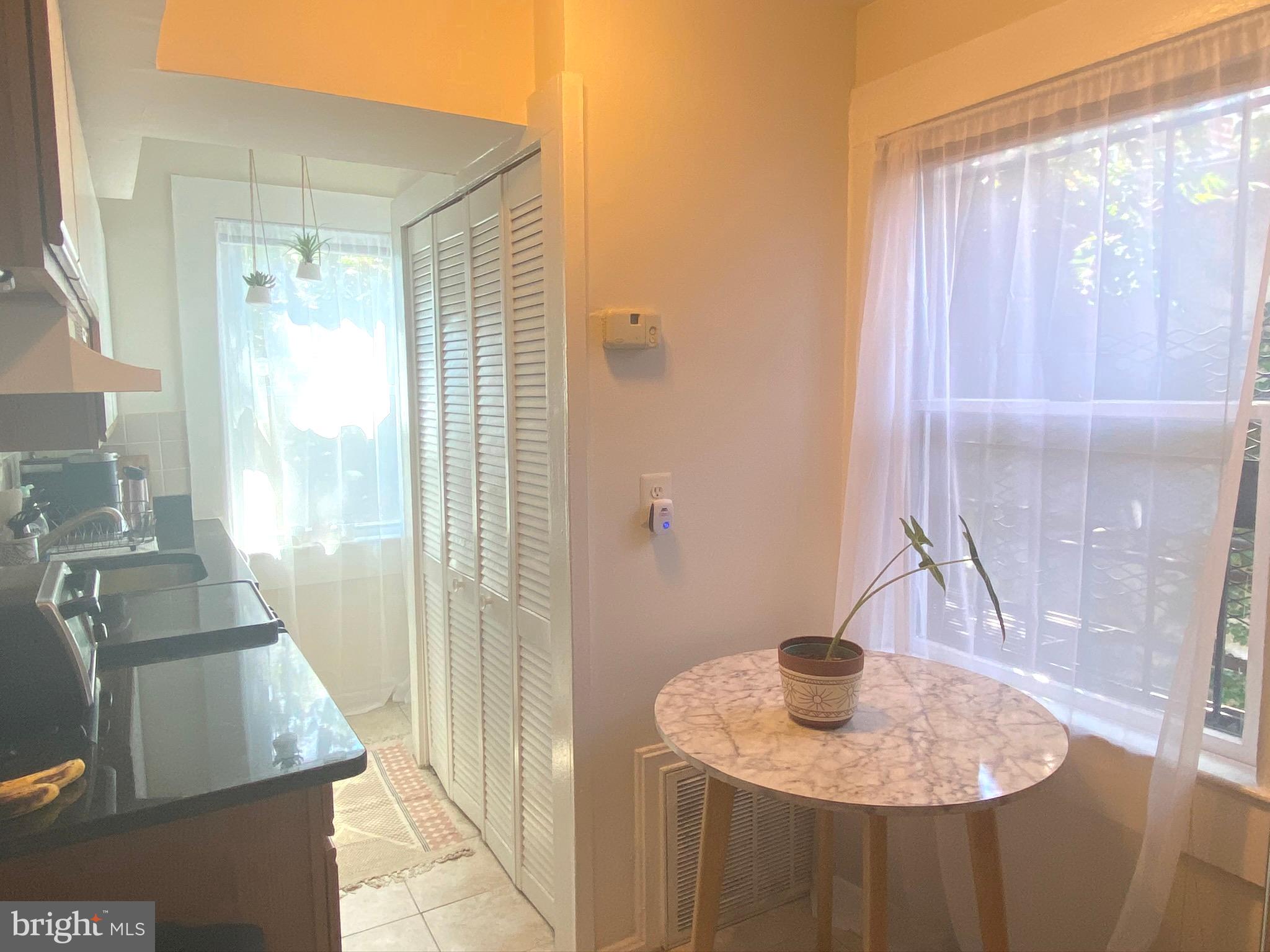 1456 Corcoran Street Northwest, Unit 3 Washington, DC 20009 - Photo 5 of 26 a bathroom with a sink and a mirror